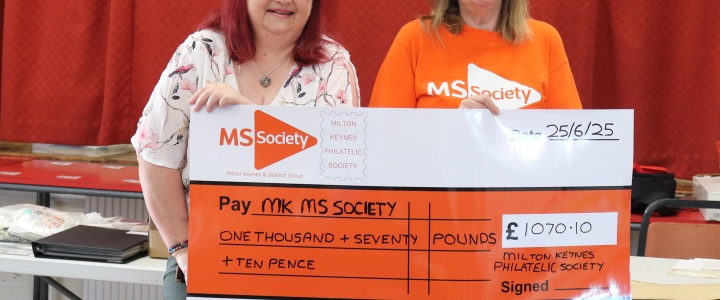 Pauline presenting cheque to MS Society from Milton Keynes Stamp Club